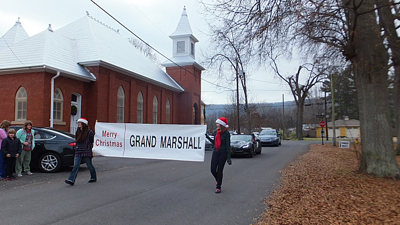 Lindsey Rose Schneider and Alexis Gisele Johnson Grand Marshal Banner Carrier