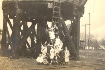 kids posed at the base of Gurley's Tank