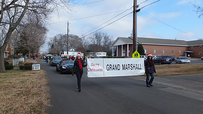 Alexis Gisele Johnson and Lindsey Rose Schneider Grand Marshal Banner Carrier